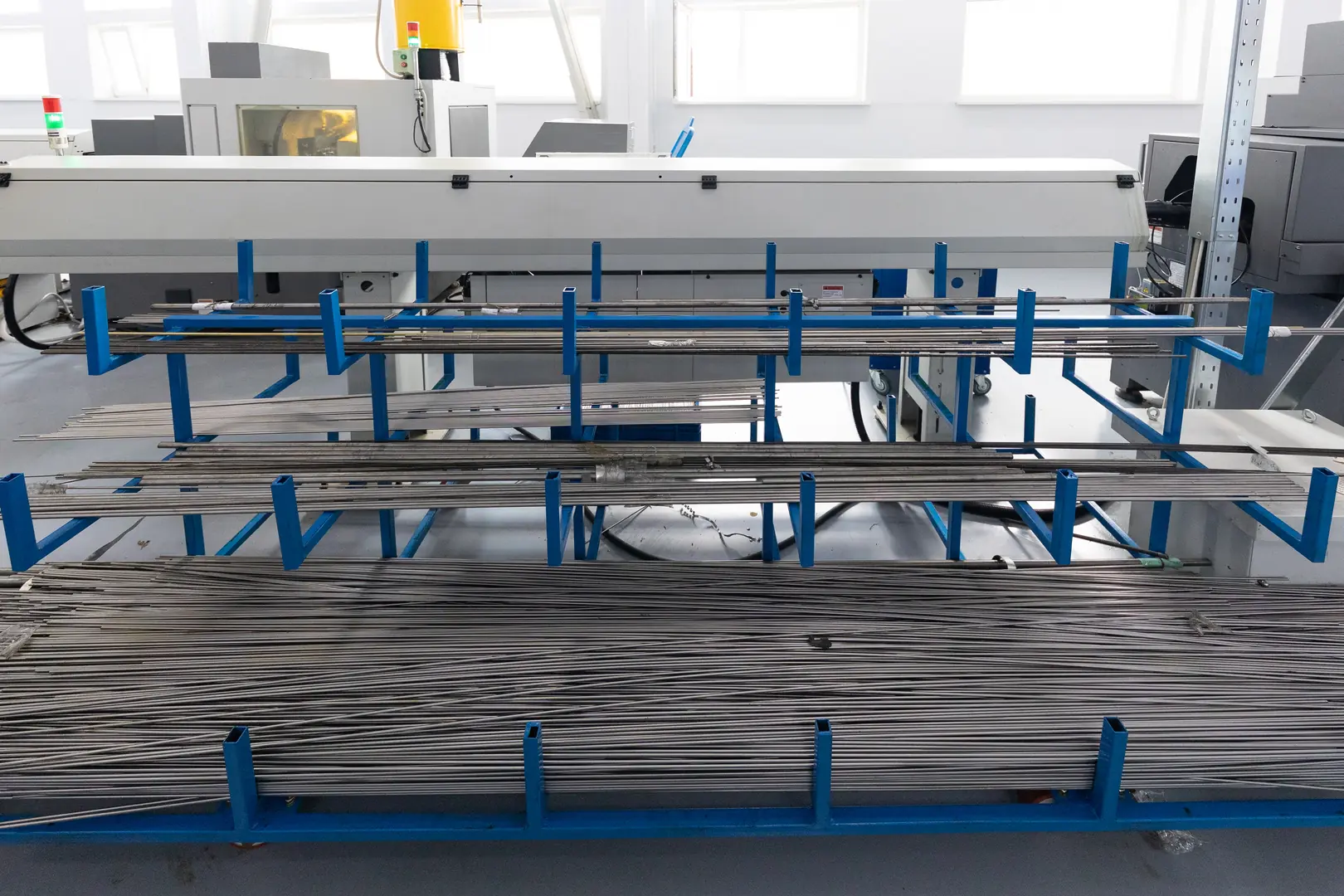 Industrial stainless steel tube production line showcasing precision welding and automated machinery